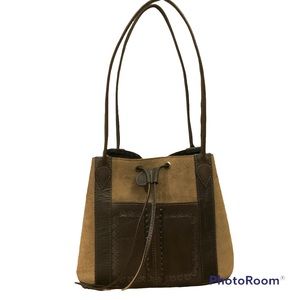 Suede bucket shoulder bag with tooled detail.